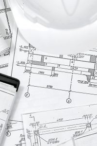 architect design working drawing sketch plans blueprints and making architectural construction model in architect studio,flat lay,architect background,architect blueprint